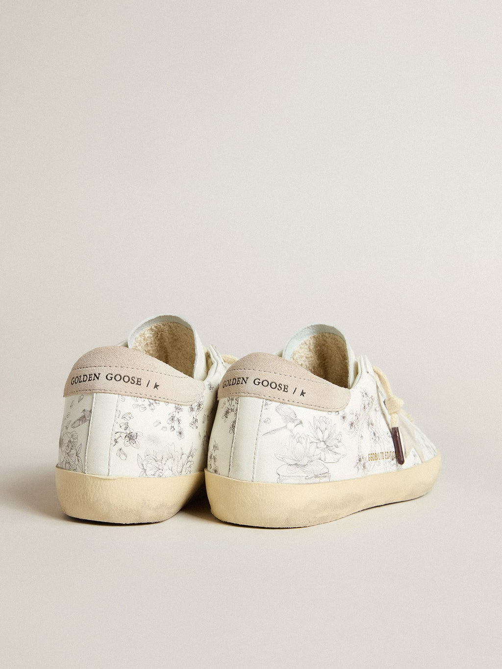 Men's Super-Star LTD CNY in white leather with lettering on the upper