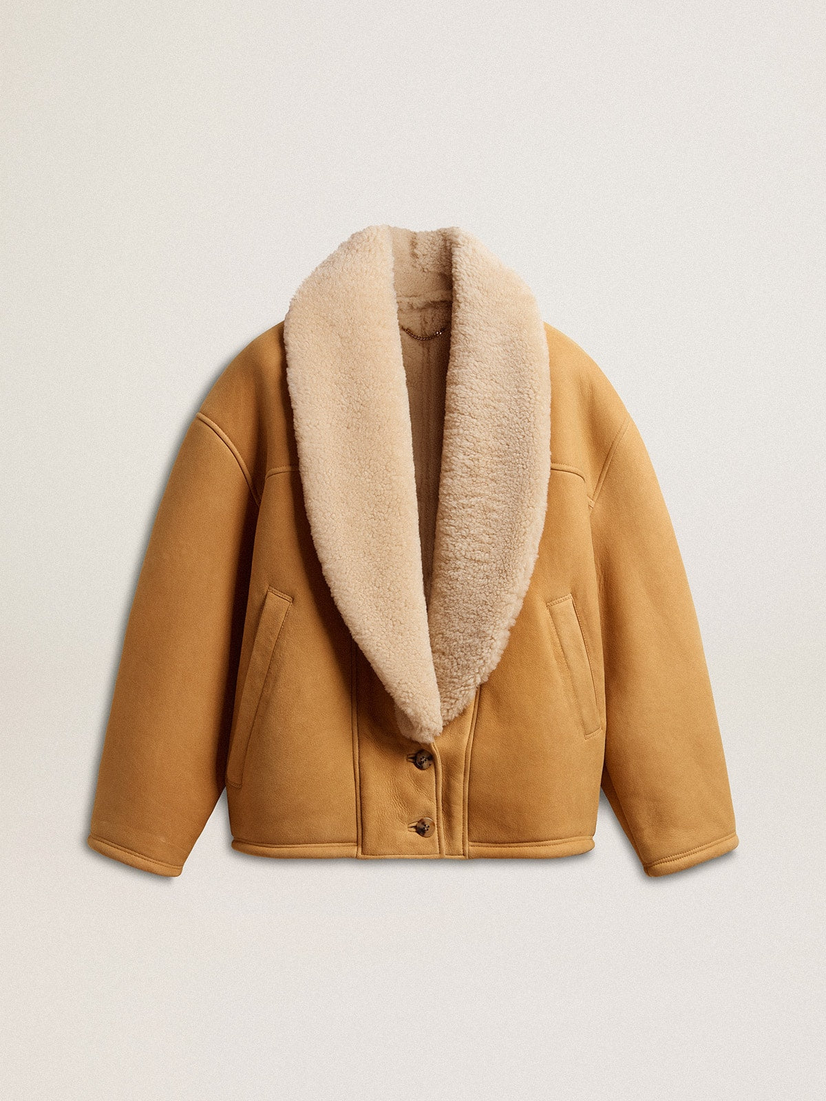 Women's sheepskin jacket with a wide shearling shawl collar