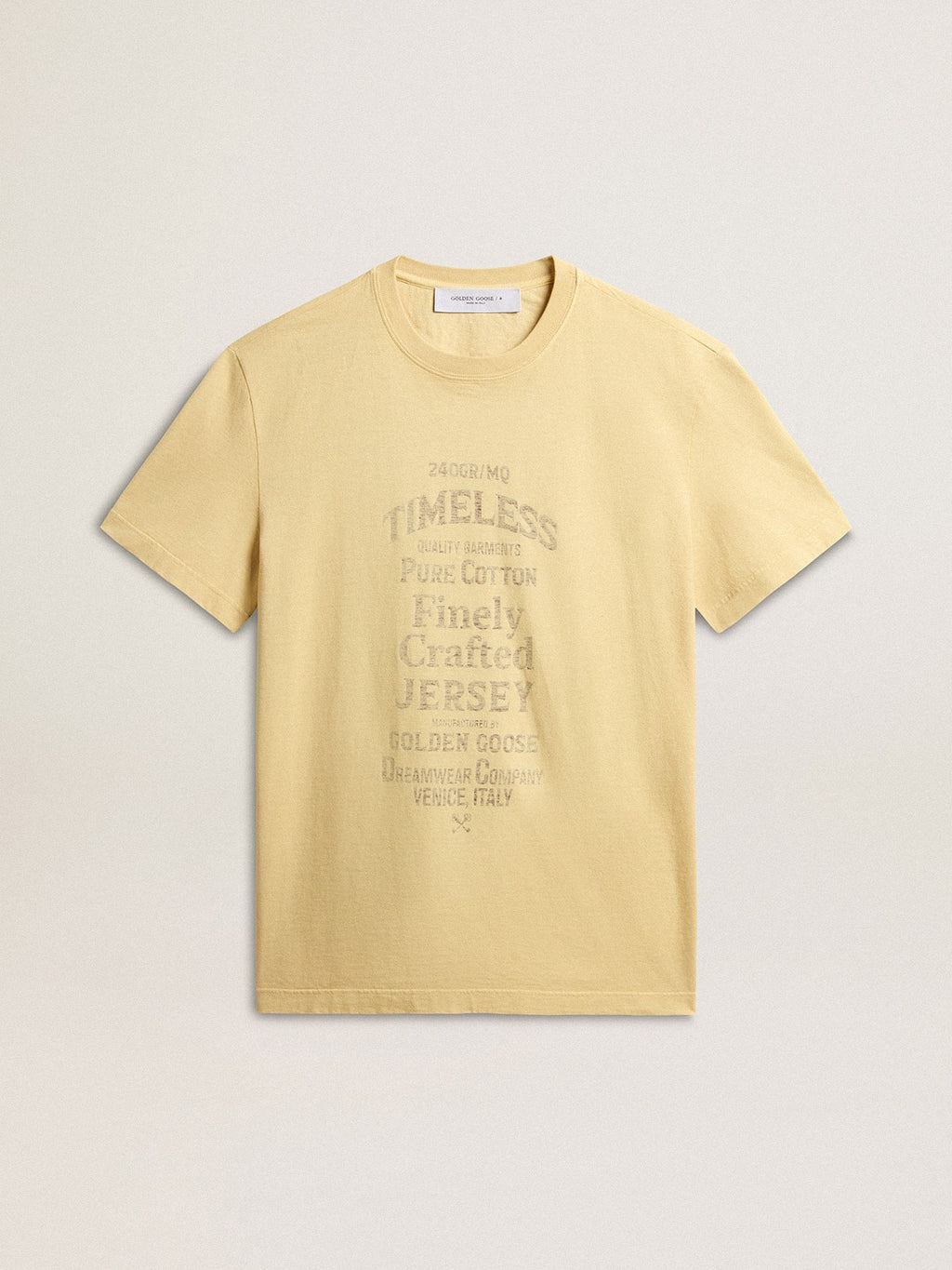 Men's cotton T-shirt in pale yellow with faded lettering