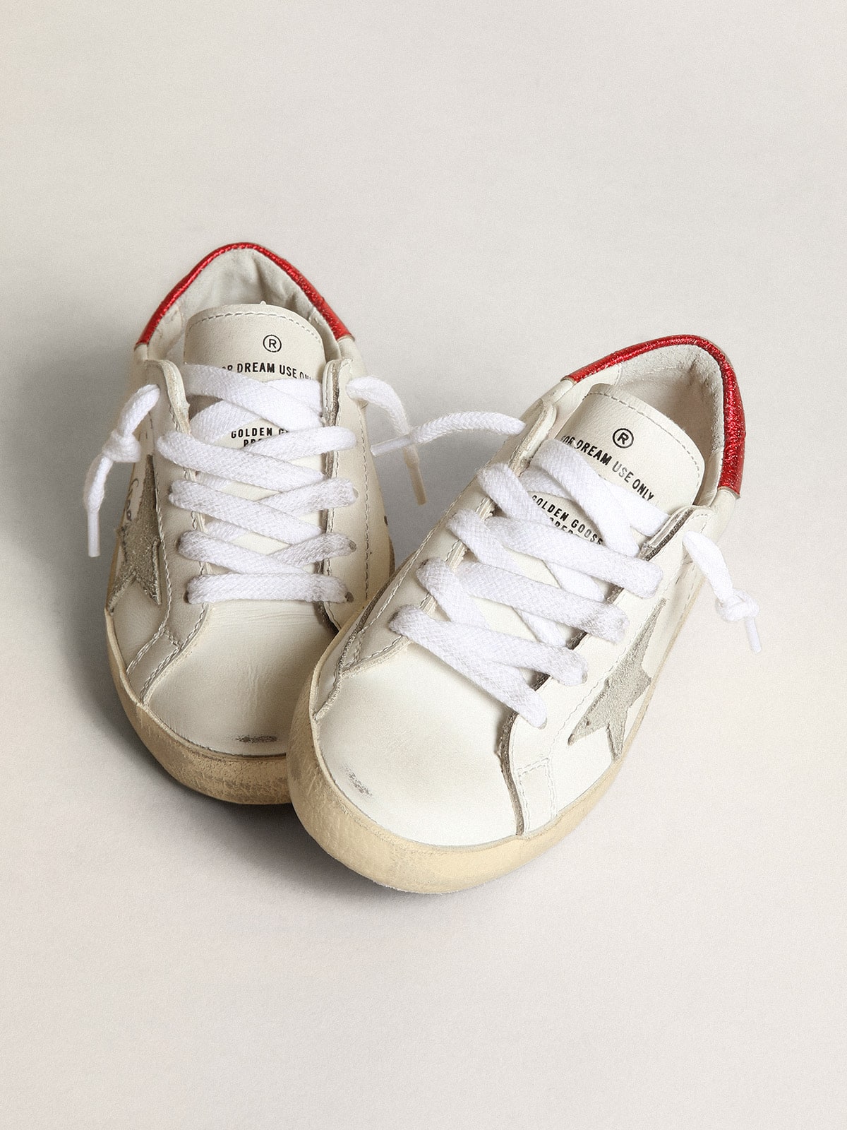 Junior Super-Star with gray star and red heel tab| Golden Goose