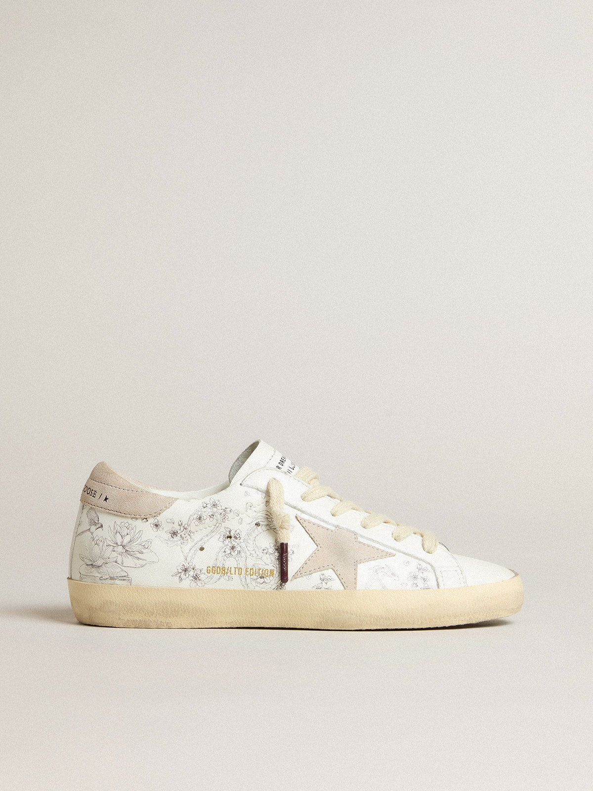 Men's Super-Star LTD CNY in white leather with lettering on the upper