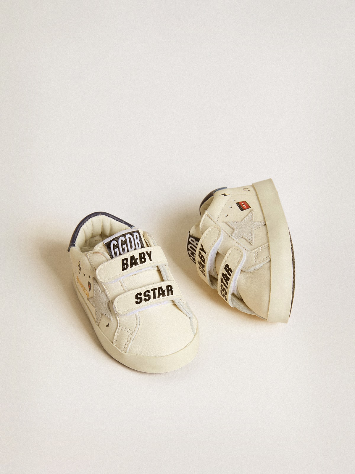 Baby School in nappa leather with musical print and white suede star